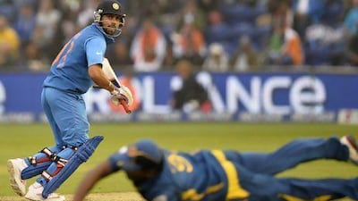 India’s Shikhar Dhawan makes his ground during the Champions Trophy semi-final against Sri Lanka on Thursday. Kirsty Wigglesworth / AP Photo
