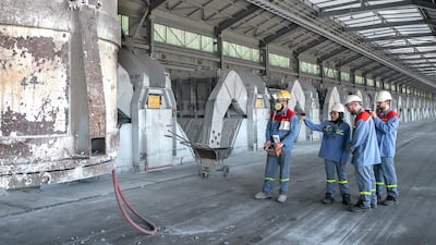 Inside the carbon plant at Emirates Global Aluminium’s smelter in Abu Dhabi's Kezad. In the last quarter of the 2023, the emirate's economy grew by 4.1 per cent. Victor Besa / The National