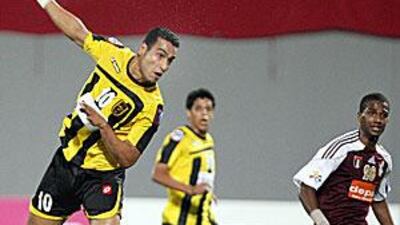 Al Ittihad's Abdelmalik Ziaya opens the scoring during his side's 2-0 win over Al Wahda at Al Nahyan Stadium last week.
