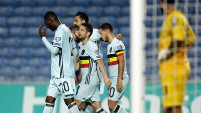 Belgium forward Christian Benteke celebrates the goal that completed his hat-trick. Jose Manuel Ribeiro / AFP