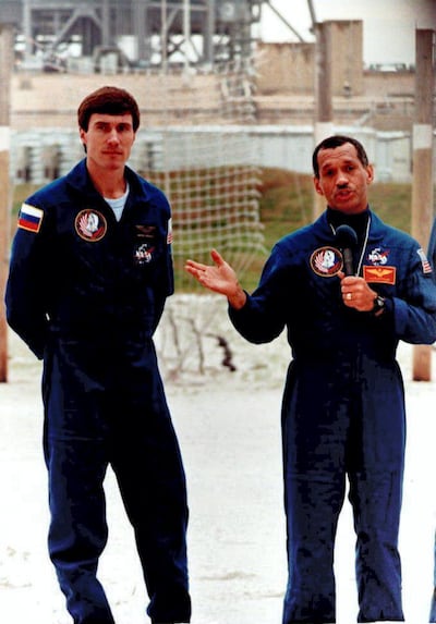 Space Shuttle Discovery Commander Charles Bolden (R) addresses the media in January 1994 alongside Sergei Krikalev. Bruce Weaver / AFP