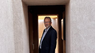 Travel writer Tim Mackintosh-Smith pose during the interview at the Dubai International Writer's Centre in Dubai. Satish Kumar / The National