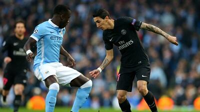 Angel di Maria of Paris Saint-Germain takes on Bacary Sagna of Manchester City during the Uefa Champions League quarter final second leg match between Manchester City FC and Paris Saint-Germain at the Etihad Stadium on April 12, 2016 in Manchester, United Kingdom. (Photo by Alex Livesey/Getty Images)