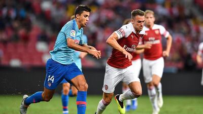 Aaron Ramsey, right, in action for Arsenal against Atletico Madrid on Thursday. Getty Images