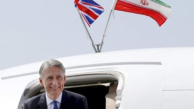 Britain's foreign secretary Philip Hammond leaves a Royal Air Force aeroplane after arriving at Mehrabad Airport in Tehran, Iran on August 23, 2015. Britain reopened its embassy in Tehran on Sunday, a historic step in the thawing of relations between the Islamic state and western powers. Darren Staples/Reuters