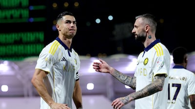 Cristiano Ronaldo of Al Nassr celebrates scoring his team's third goal with teammate Marcelo Brozovic. Getty Images