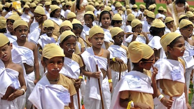 Schoolchildren dressed as Mahatma Gandhi take part in an attempt to set a new Guiness World Record, for the largest gathering of people dressed as Gandhi, during celebrations to mark the 146th birth anniversary of Gandhi, in Bengaluru, India. Mahatma Gandhi, also known as “Father of the Nation”, was instrumental in India’s struggle for independence from Britain and was a devoted follower of non-violent protest and religious tolerance. Abhishek N. Chinnappa / Reuters