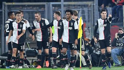 Juventus' Cristiano Ronaldo (R) celebrates with his teammates. EPA