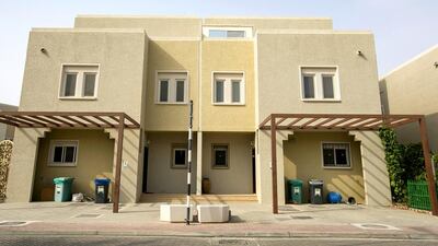 Al Reef villas: Q3 no change. 2BR - Dh110-125,000. 3BR - Dh130-140,000. 4BR - Dh150-165,000. 5BR - Dh180-190,000. Q3 2013-Q3 2014 up 11%. Mona Al-Marzooqi / The National