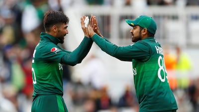 Pakistan's Mohammad Amir celebrates with Haris Sohail. Reuters