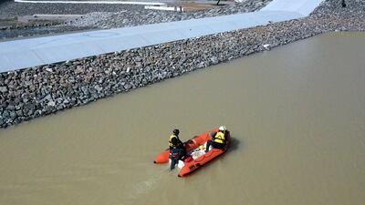 Search and rescue teams look for the body of a man who went missing during a flash flood in the UAE. Courtesy RAK Police