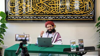 Imam Hassanat Ahmed delivers his Friday broadcast entitled 'Preparing for a Unique Ramadan' via multiple social media platforms from the otherwise empty Noor Ul Islam Mosque on the day before Ramadan commences in the UK, in Bury, north-west England on April 24, 2020. AFP