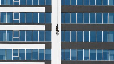 A Sri Lanka Army commando soldier takes part in a drill rehearsal simulating a hostage rescue operation at a luxury hotel building in Colombo, Sri Lanka EPA
