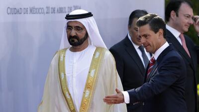 Sheikh Mohammed inspects the guard of honour with Mexican President, Enrique Peña Nieto. Henry Romero / Reuters