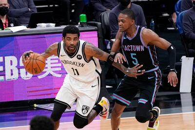 Brooklyn Nets guard Kyrie Irving, left. AP