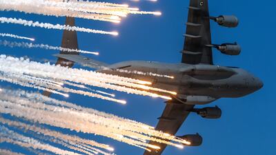 A military aircraft carries out a display during the event.