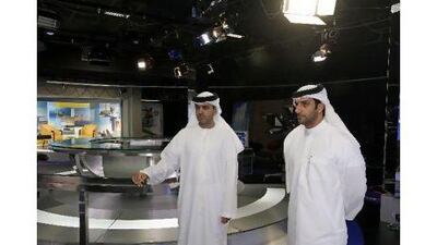 Sheikh Sultan bin Ahmed Al Qasimi, the chairman of SMC, right, and Dr Khaled Omar al Midfa, the head of Sharjah Radio and TV.