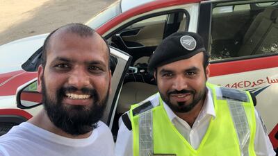 Mr Sonawane was offered water by police in Ras Al Khaimah as he walked from the northern emirate to Abu Dhabi this week