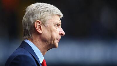 Arsene Wenger observes his Arsenal side during their 2-1 loss to Tottenham Hotspur on Saturday in the Premier League. Paul Gilham / Getty Images / February 7, 2015