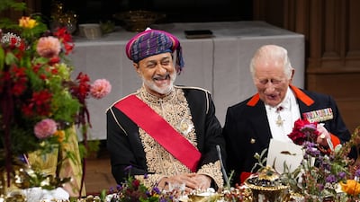 Sultan Haitham of Oman wore a striped turban and embroidered bisht abaya at the state banquet. Getty Images