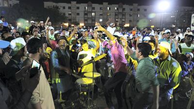 Workers enjoy the Camp Ka Champ – DU singer of the Season competition.