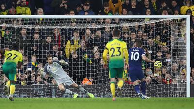 Harry Kane scores from the penalty spot at Carrow Road. Getty Images