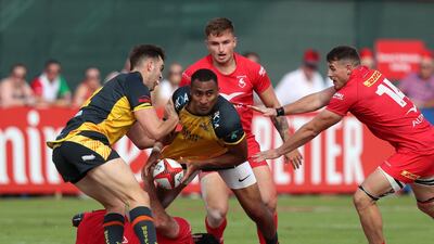 Saki Naisau of Dubai Hurricanes in action against Bahrain during the Gulf Men's final at the 2019 Dubai Rugby Sevens. Chris Whiteoak / The National
