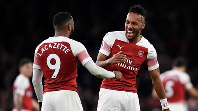 Pierre-Emerick Aubameyang, right, and Alexandre Lacazette celebrate Arsenal's win over Tottenham. EPA