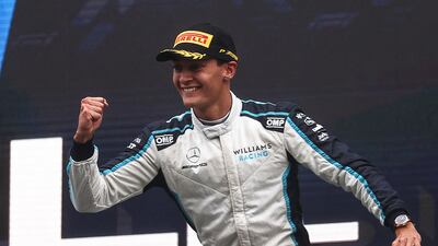 Williams' British driver George Russell celebrates his second-place. AFP