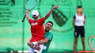 Serbia's Novak Djokovic celebrates while playing an exhibition match against Croatia's Ivan Dodig. AP Photo