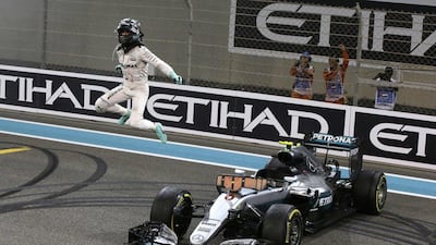 Nico Rosberg celebrates after finishing second to win the 2016 world championship during the Abu Dhabi Grand Prix at the Yas Marina racetrack. Luca Bruno / AP