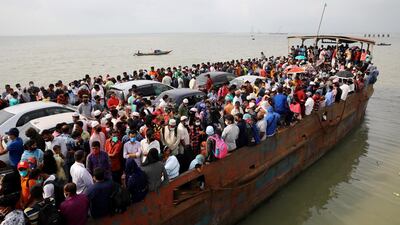 Migrant people are seen on board of an overcrowded ferry, as they go home to celebrate Eid al-Fitr in Munshiganj, Bangladesh. Reuters