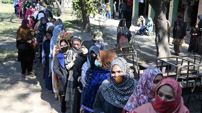 Women line up to cast their votes at a polling station in Lahore during general elections in Pakistan. EPA