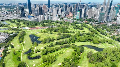 The skyscrapers of Kuala Lumpur loom over The Royal Selangor Golf Club. Photo: The Royal Selangor Golf Club