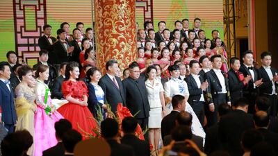 The North Korean leader, who was greeted by a military honour guard and cheering children at the Great Hall of the People. KCNA via Reuters