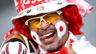 A fan poses for a photo ahead of the game. Getty Images