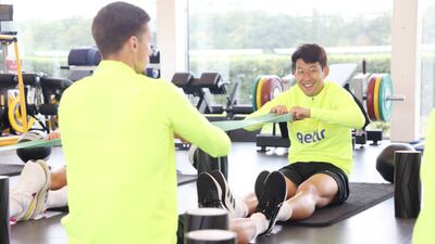 Son Heung-Min stretches during training. Getty Images