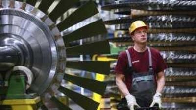 Siemens, the largest industrial group in Europe, last month said that it would no longer enter into new deals with Iran. Above, a worker at the Siemens gas turbine factory in Berlin.