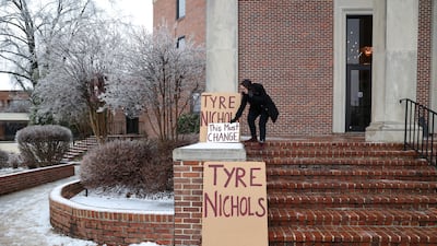 Signs outside the February 1 memorial service venue for black man Tyre Nichols, who died after being beaten by Memphis police officers. Reuters