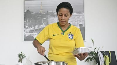 Cynthia Barbosa has reached out to her friends on social media to finance and cook meals for workers in Abu Dhabi. Lee Hoagland / The National