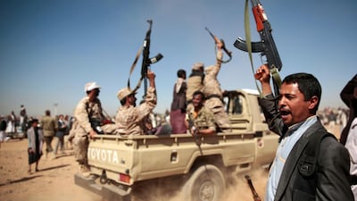 A tribesman loyal to the Houthi rebels chants during a gathering to mobilise more fighters to fight pro-government forces. Hani Mohammed / AP