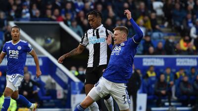 Newcastle's Joe Willlock, left, and Leicester's Harvey Barnes challenge for the ball. AP