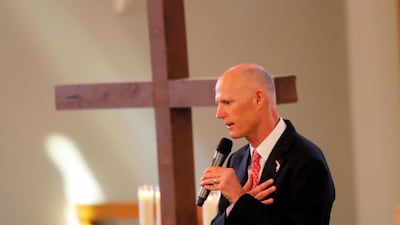 Republican governor Rick Scott, pictured addressing the congregation during a Sunday service at the First United Methodist Church of Coral Springs, said he will work to make sure people with mental illnesses don’t have access to guns but offered no specifics. AP Photo/Gerald Herbert