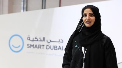 Aisha Bin Bishr, the director general of the Smart Dubai Office, says that technology is only a means to an end, but when used correctly and in creative ways it can create happiness. Pawan Singh / The National