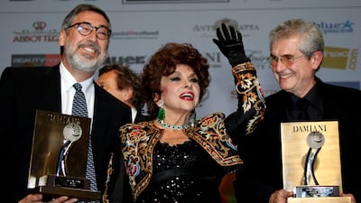 From left, filmmaker John Landis, Lollobrigida and director Claude Lelouch at the 10th Monte Carlo Film festival in 2010. Reuters