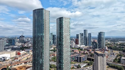 Recently built skyscrapers tower over a modernised Manchester. Getty Images