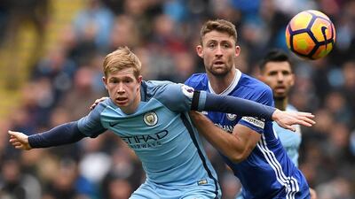 Chelsea's English defender Gary Cahill, right, vies with Manchester City's Belgian midfielder Kevin De Bruyne during the English Premier League football at the Etihad Stadium in Manchester, north west England, on December 3, 2016. Paul Ellis / AFP