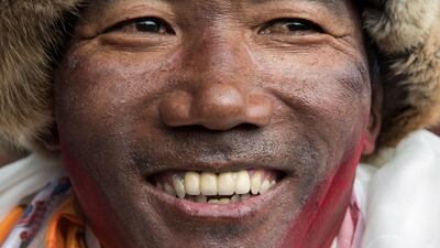 Nepalese veteran mountaineer Kami Rita Sherpa, 48, looks on after arriving from Everest Base camp. Narendra Shrestha / EPA