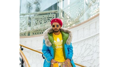 You wouldn't lose the actor in a crowd in this super-bright combo of yellow tee, blue parka and printed pants, from February 12, 2019. Instagram / Ranveer Singh