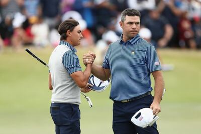 Rickie Fowler of the US team and Gary Woodland at the Royal Melbourne Golf Club. EPA